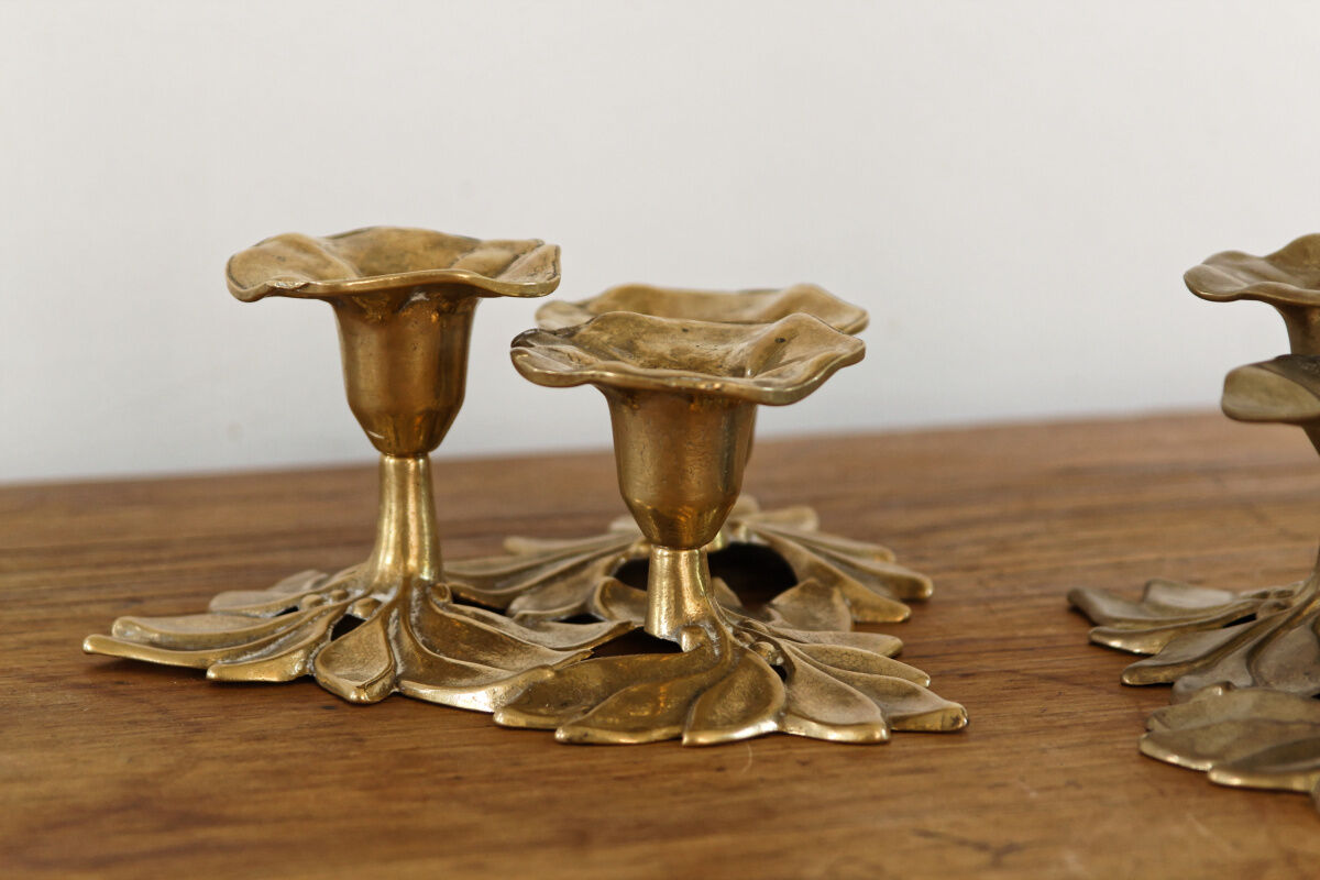 Pair of triple brass candle holders