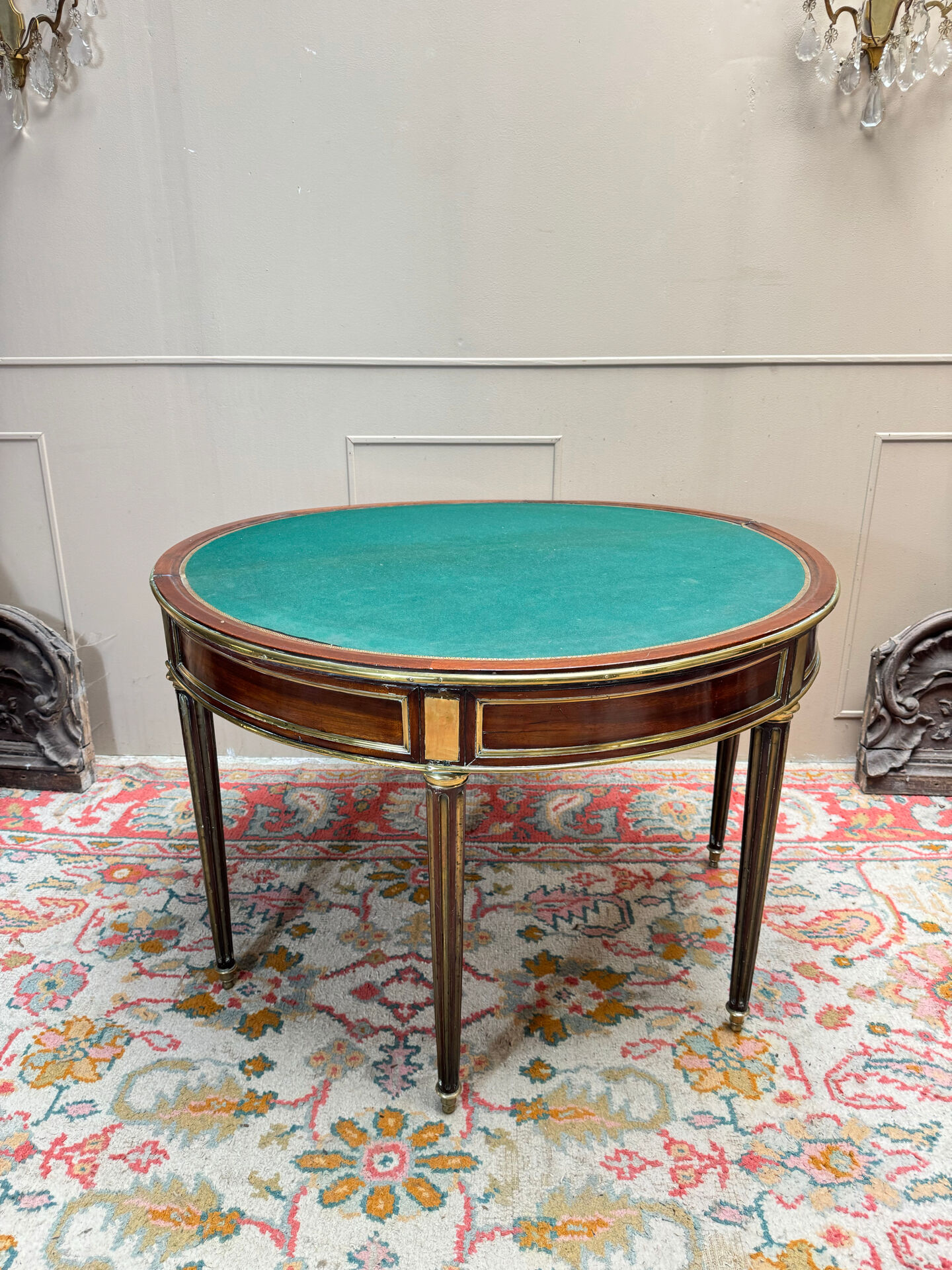 Half-moon table in mahogany from the Louis XVI period, 18th century.