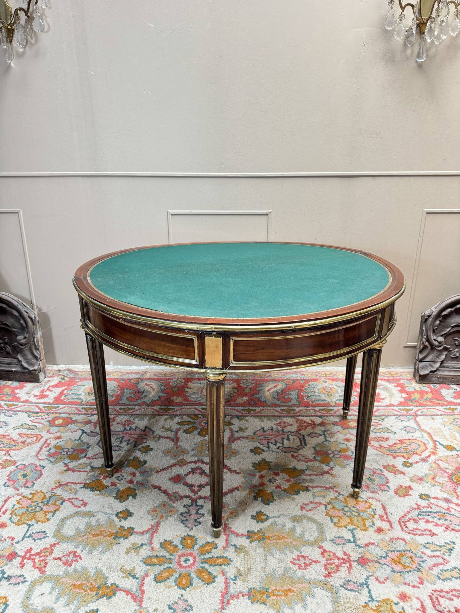 Half-moon table in mahogany from the Louis XVI period, 18th century.