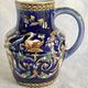 Old cream jug Gien Renaissance blue background 1938/1960