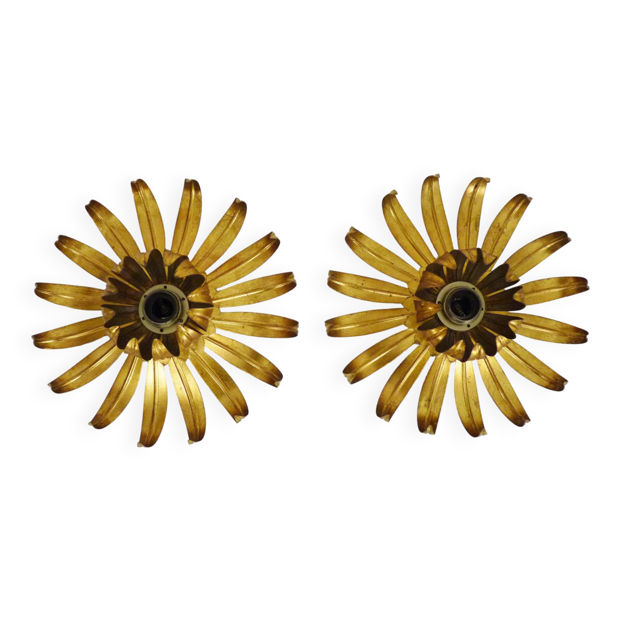 Pair of palm tree wall lights in gold metal. 70s