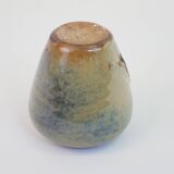 Small beige glazed ceramic vase with abstract relief pattern