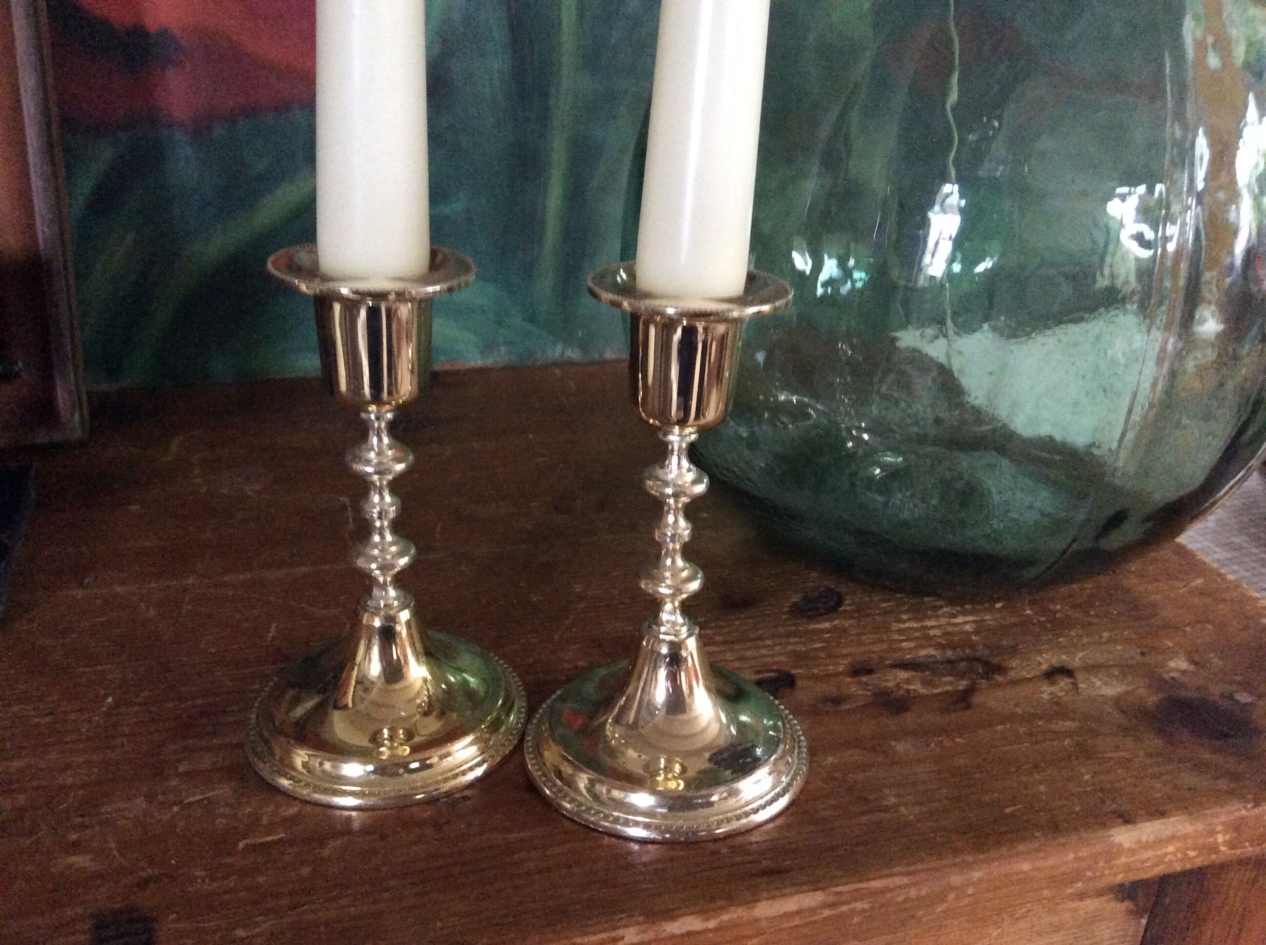 Pair of gold metal candle holders