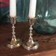 Pair of gold metal candle holders