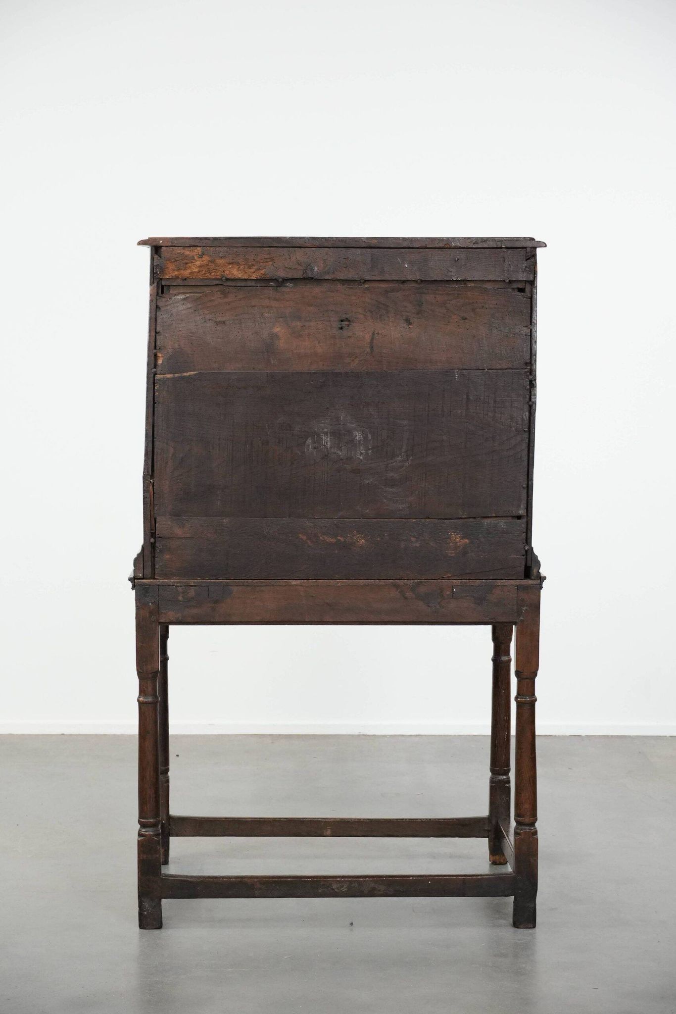 Unique antique English cabinet on stand made of oak from the 17th century