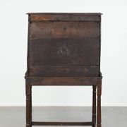 Unique antique English cabinet on stand made of oak from the 17th century