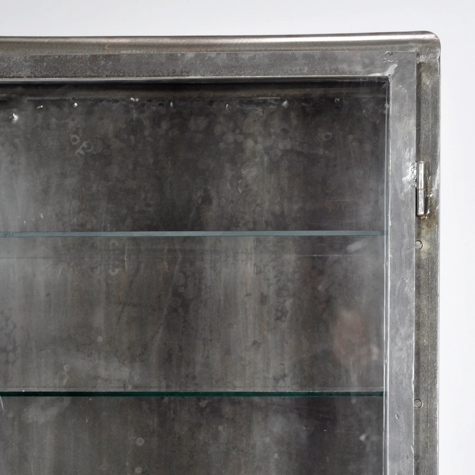 Polished iron medicine cabinet, 1950s