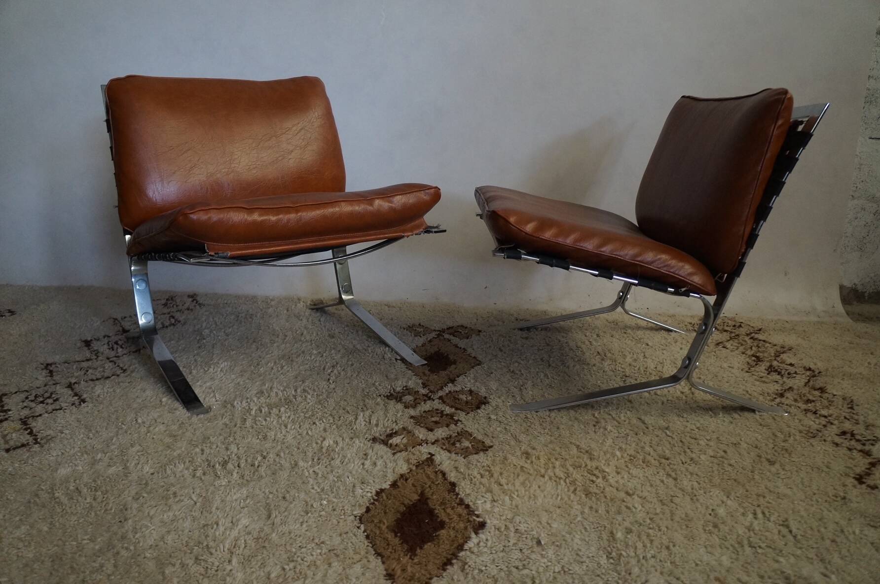 pair of Joker Olivier Morgue armchairs