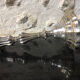 Antique candle holder in silvered bronze