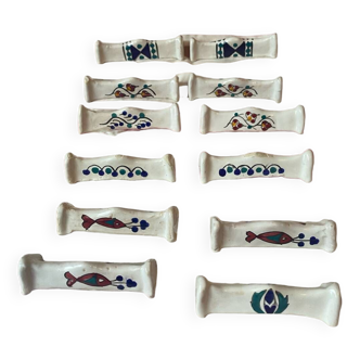 12 vintage artisanal ceramic terracotta knife holders