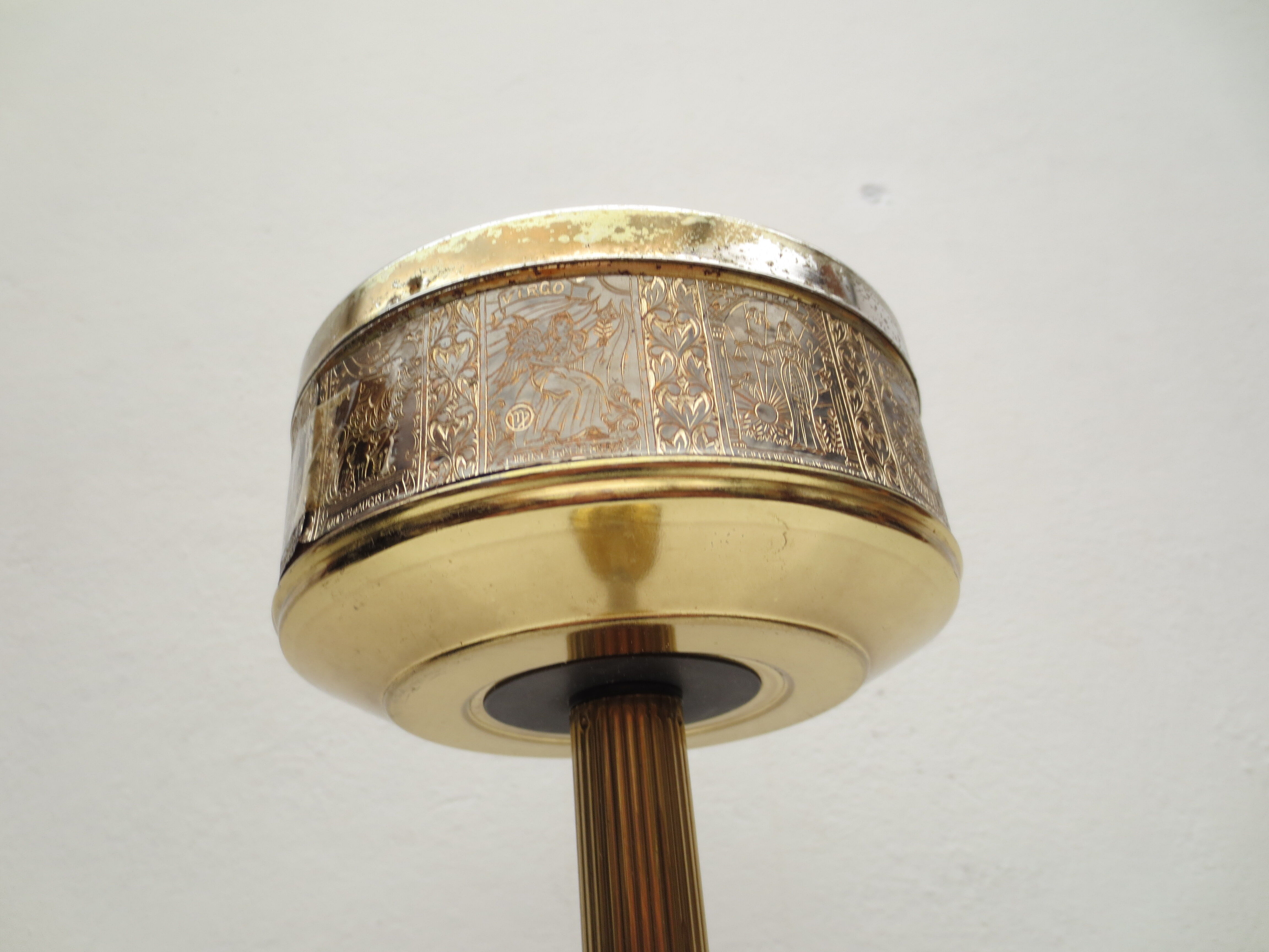Old ashtray on foot year 50 in gilded brass