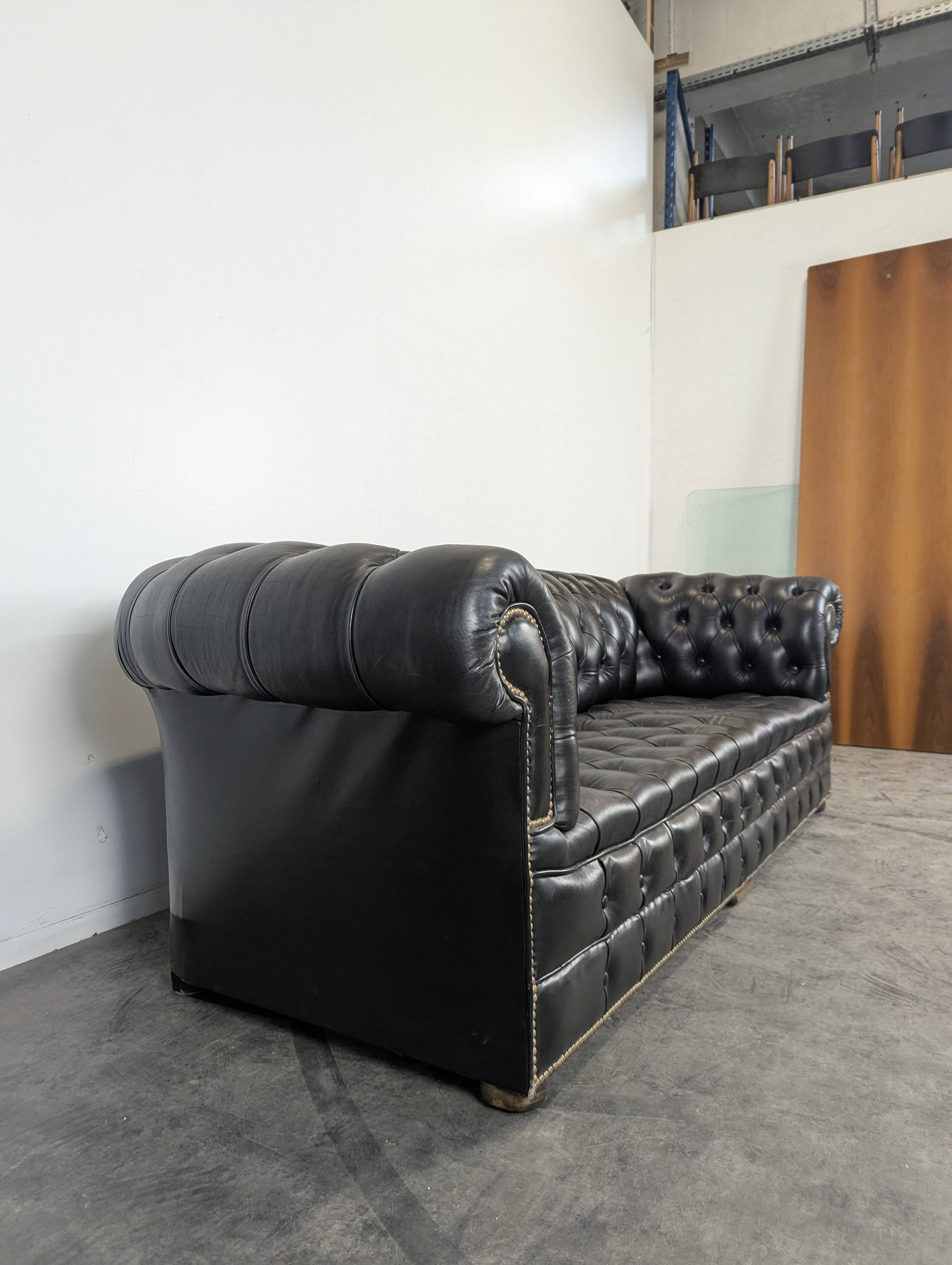 Black Chesterfield sofa for 4 people