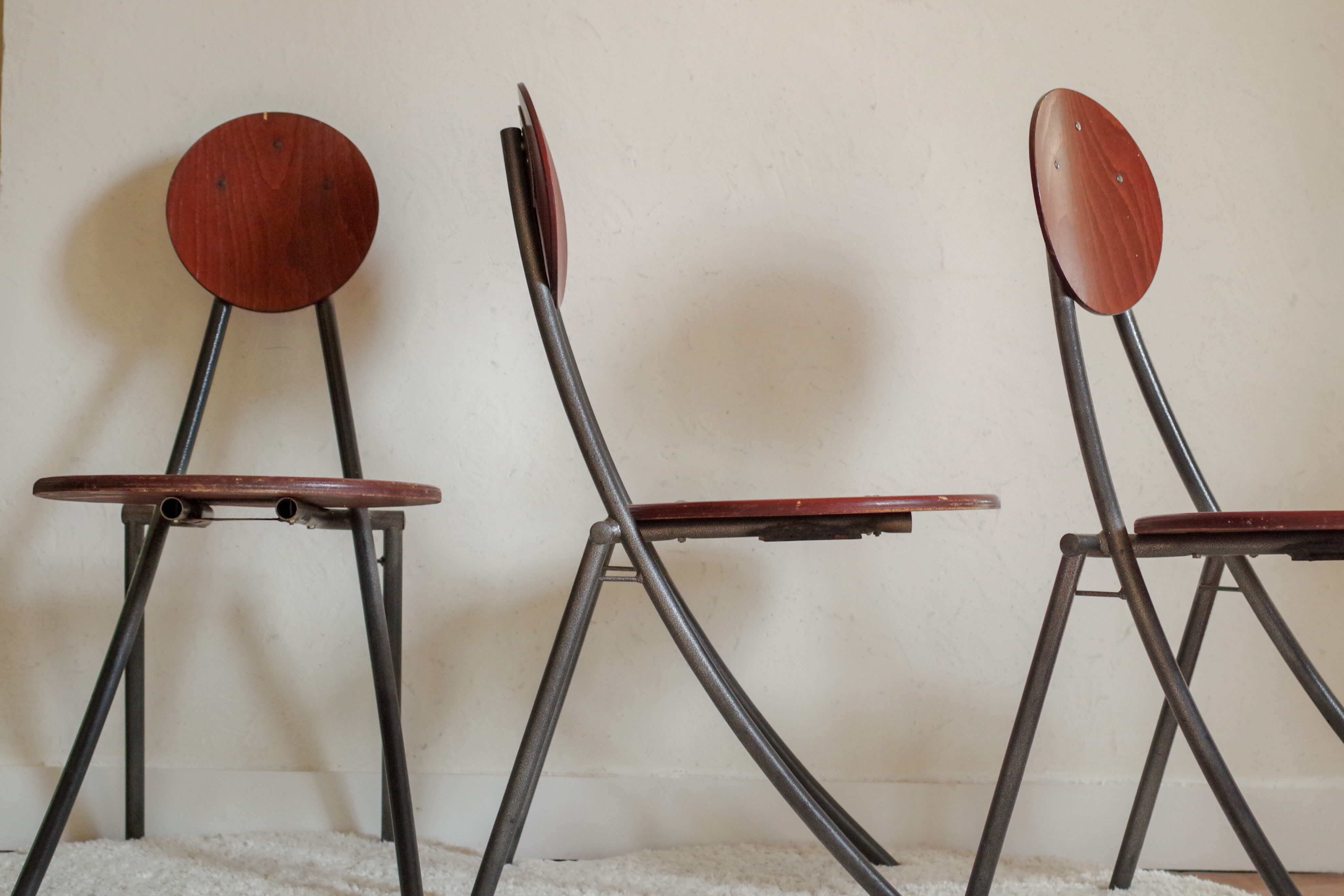 Old wooden chair and seated metal and round back