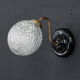 Globe wall applies in molded glass, brass swan collar