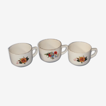 3 vintage cups decorated with flowers
