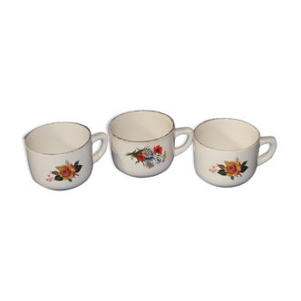 3 vintage cups decorated with flowers