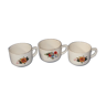 3 vintage cups decorated with flowers