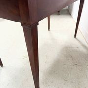 Louis XVI style desk in mahogany and veneer, 20th century.
