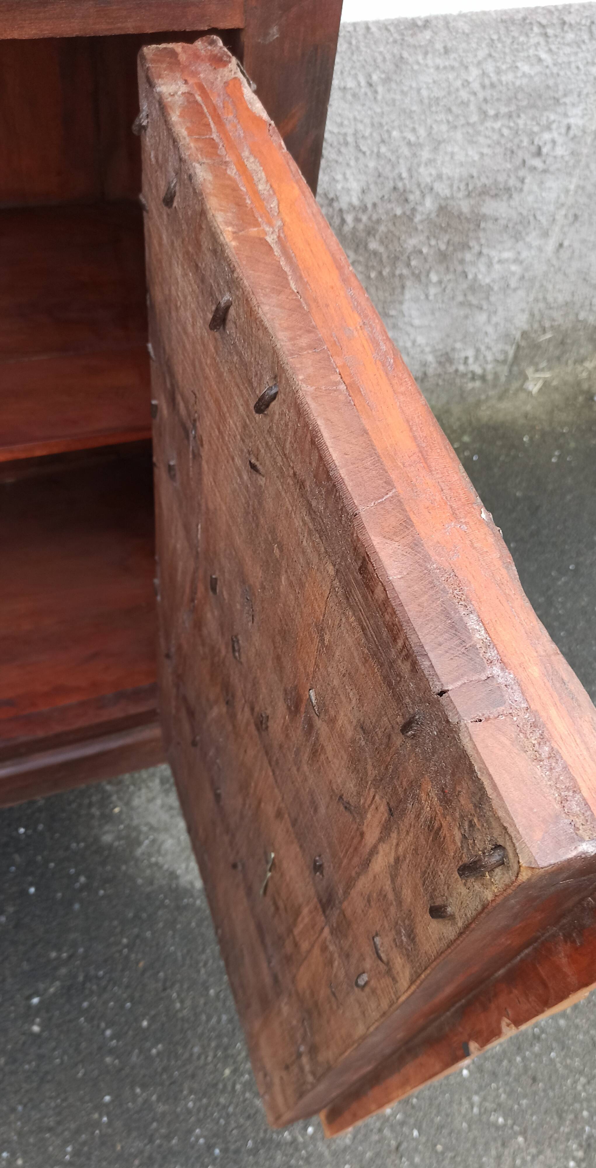Small old wooden sideboard with two doors