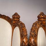 Pair of neoclassical style bergère armchairs