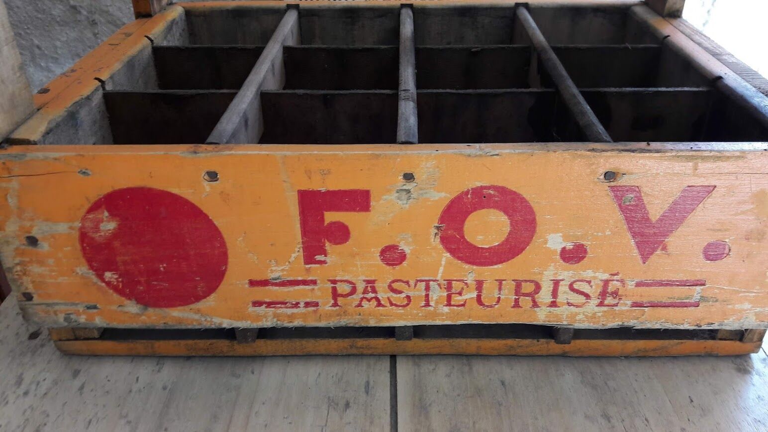 Old locker wooden milk bottles