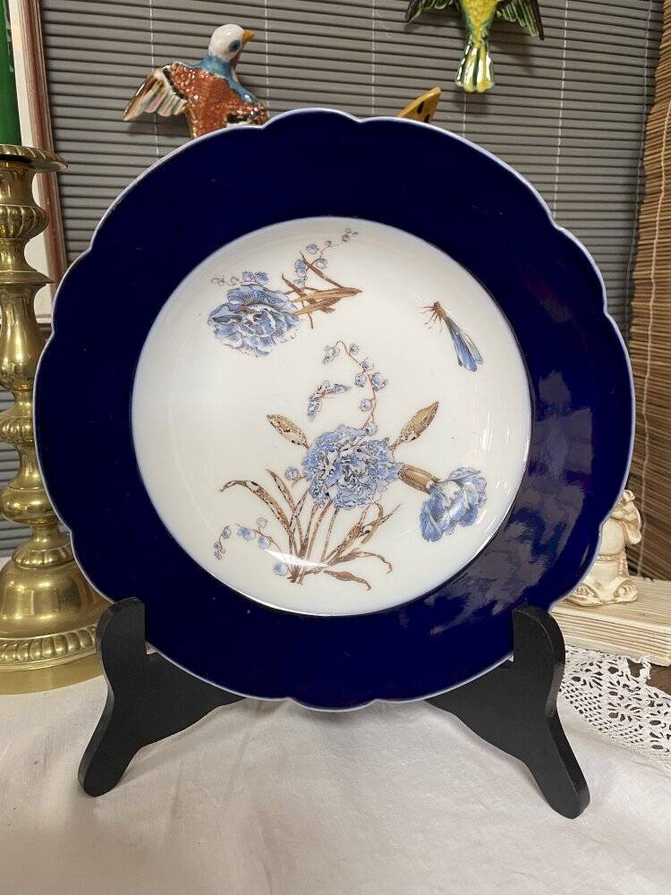 Assiette creuse aux œillets bleu estampillée D & Cie Frande