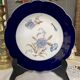 Assiette creuse aux œillets bleu estampillée D & Cie Frande