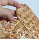Vintage flower suspension in wicker rattan