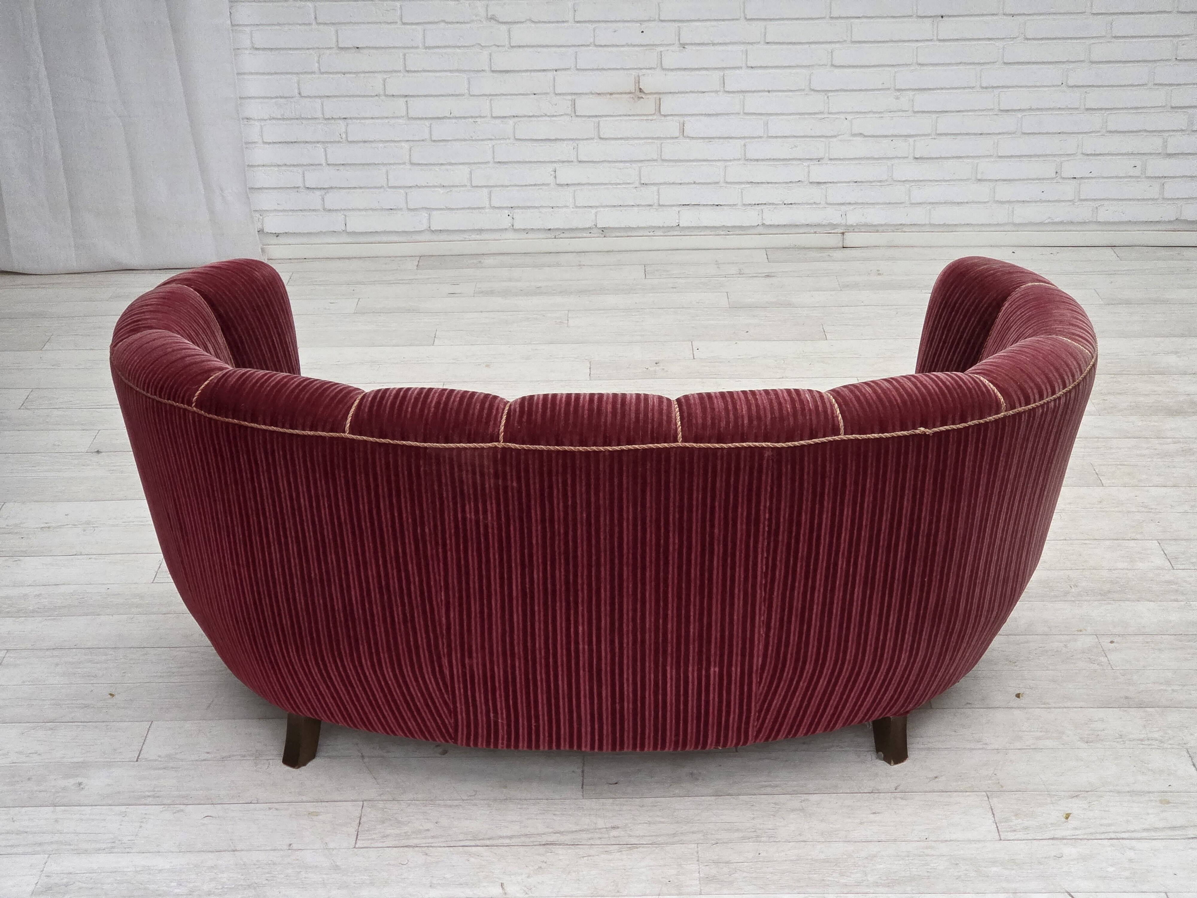1960s, Danish 2-seater "Banana" sofa, red furniture velour, oak wood.