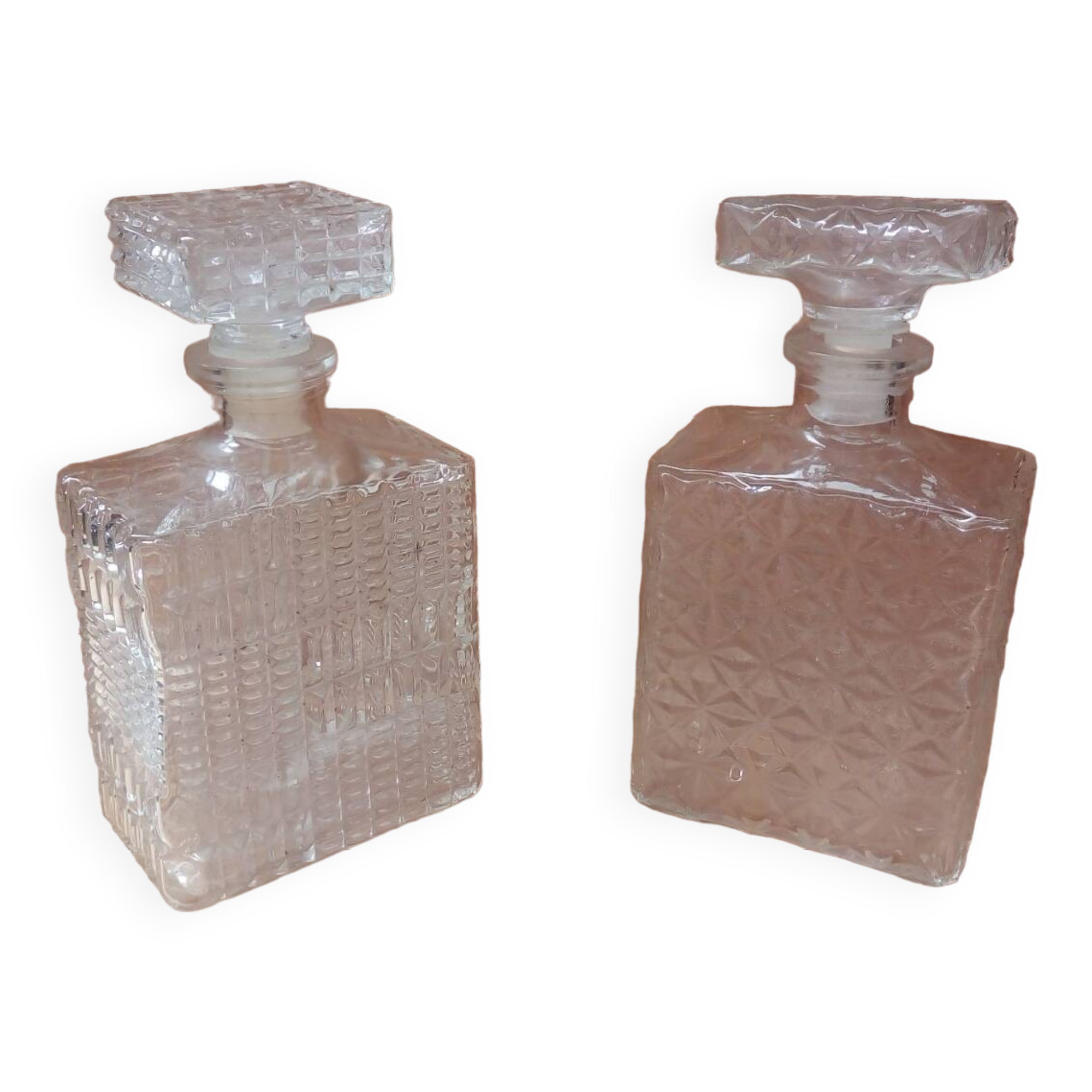 Pair of molded glass whiskey liqueur carafes + vintage stoppers