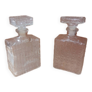 Pair of molded glass whiskey liqueur carafes + vintage stoppers