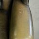 Vintage cowhide leather Chesterfield wingback armchair in a green colour