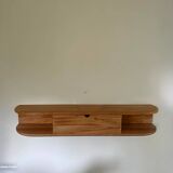 Floating entrance console in solid recycled beech and its practical storage