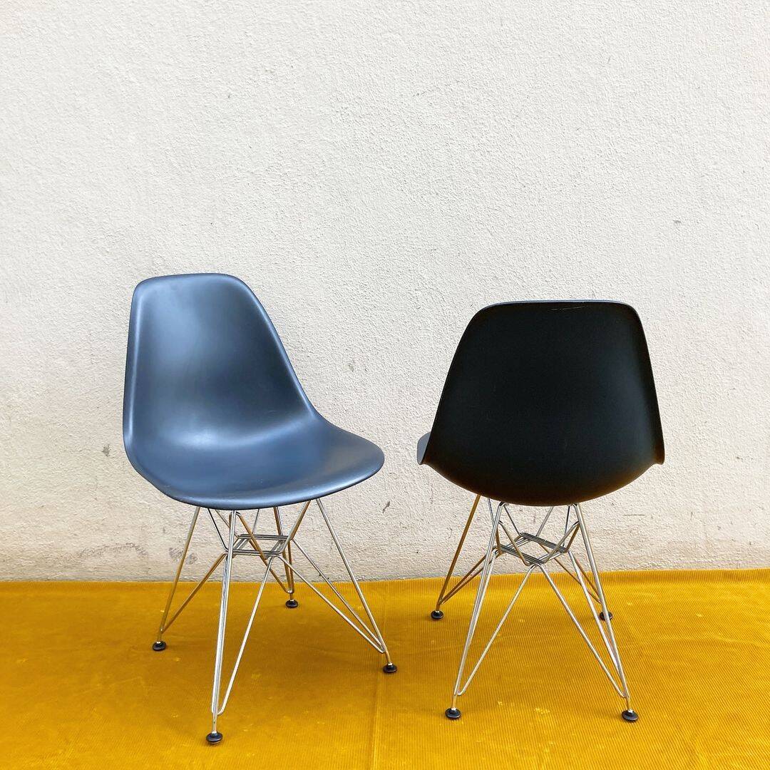 Pair of black Vitra DSR chairs