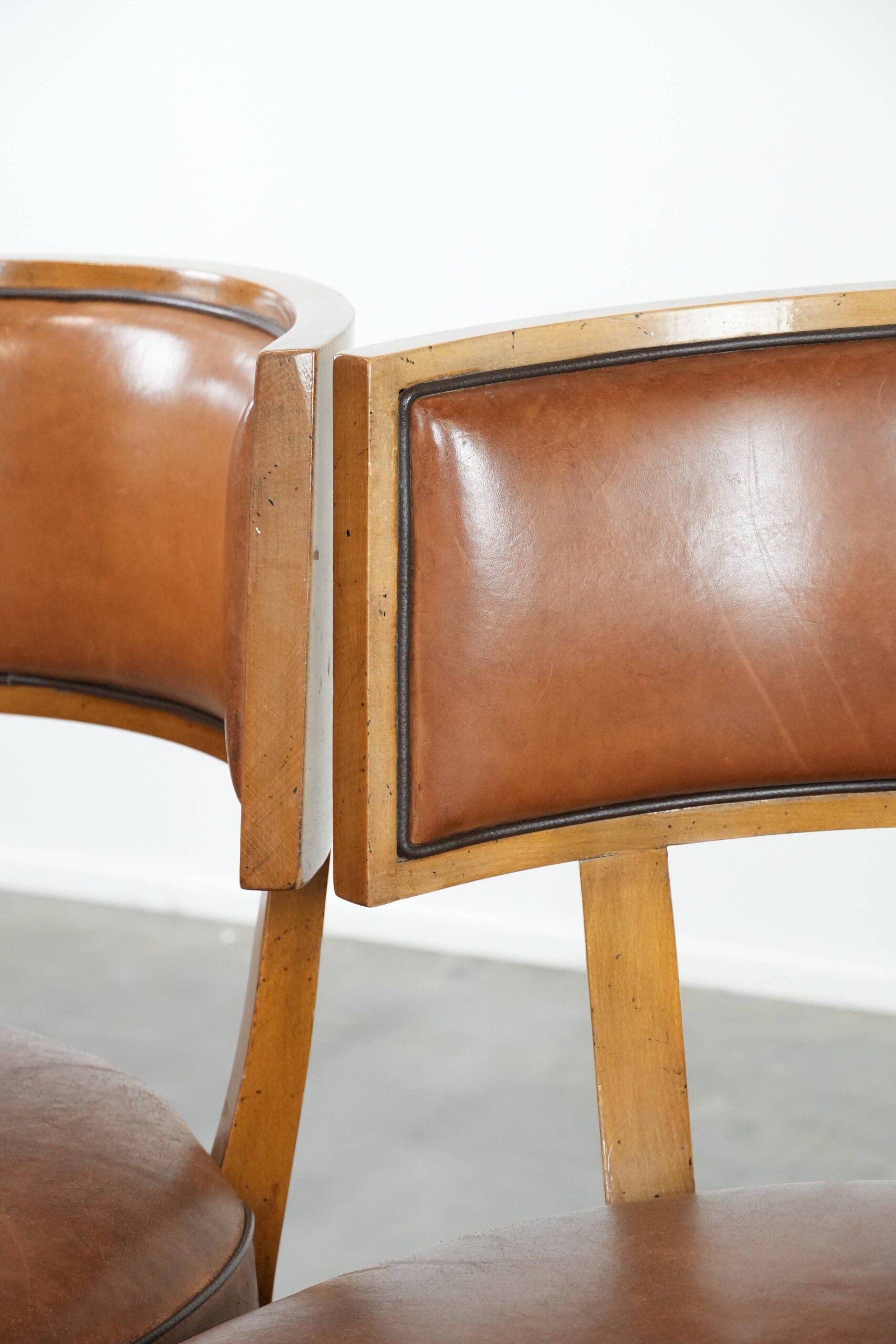 Set of 2 vintage design cocktail chairs/armchairs made of sheepskin leather
