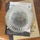 Vintage 1970s round wall light ceiling fixture with transparent glass.
