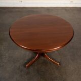 Table with central legs and 2 extensions.