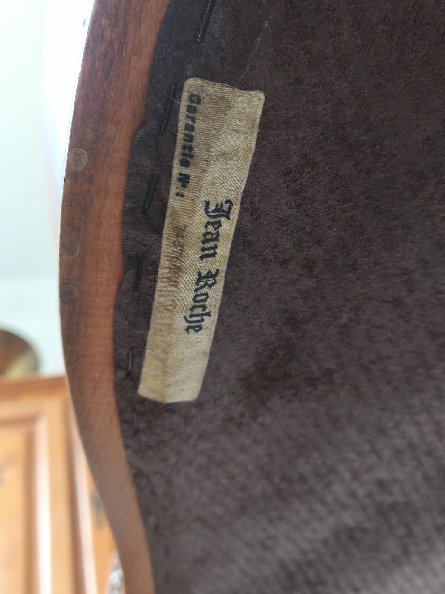 Leather armchair signed