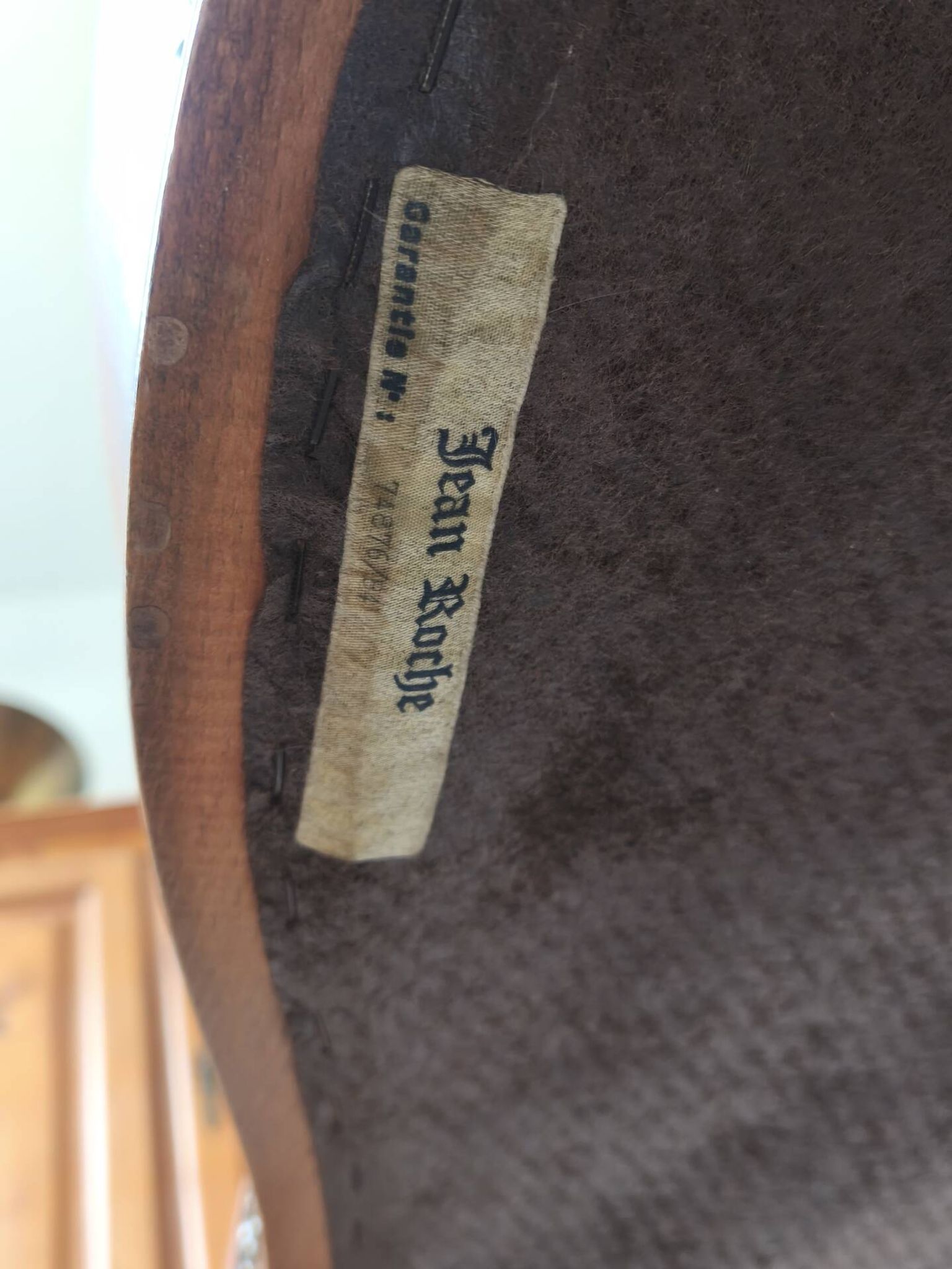 Leather armchair signed