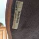 Leather armchair signed