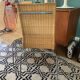 Trio of vintage Ikea rattan and aluminum chairs