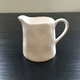 White pitcher streaked in relief