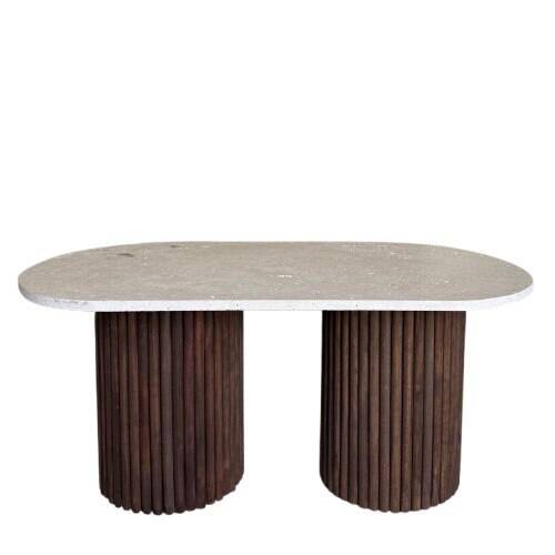 Oval coffee table in travertine and fluted wood.
