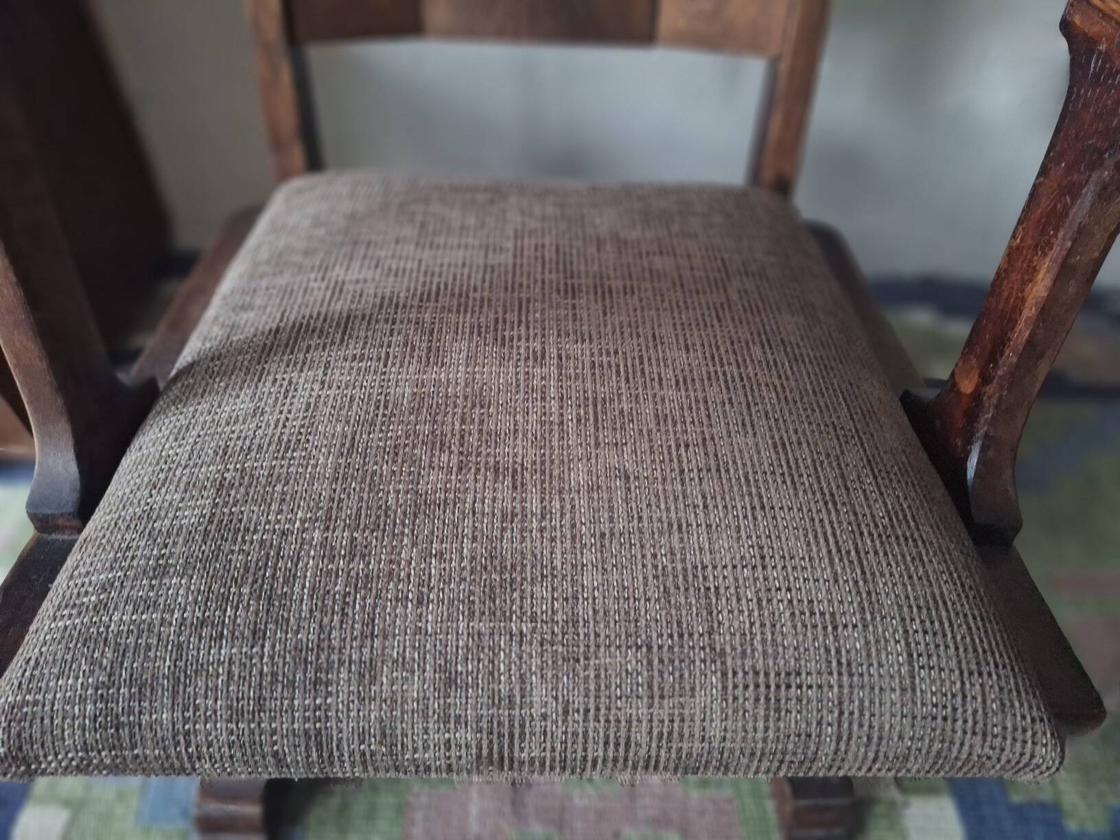Antique Gothic Revival carved oak armchair, 1910