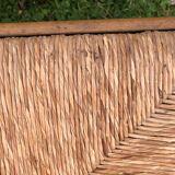 4 wood and straw chairs