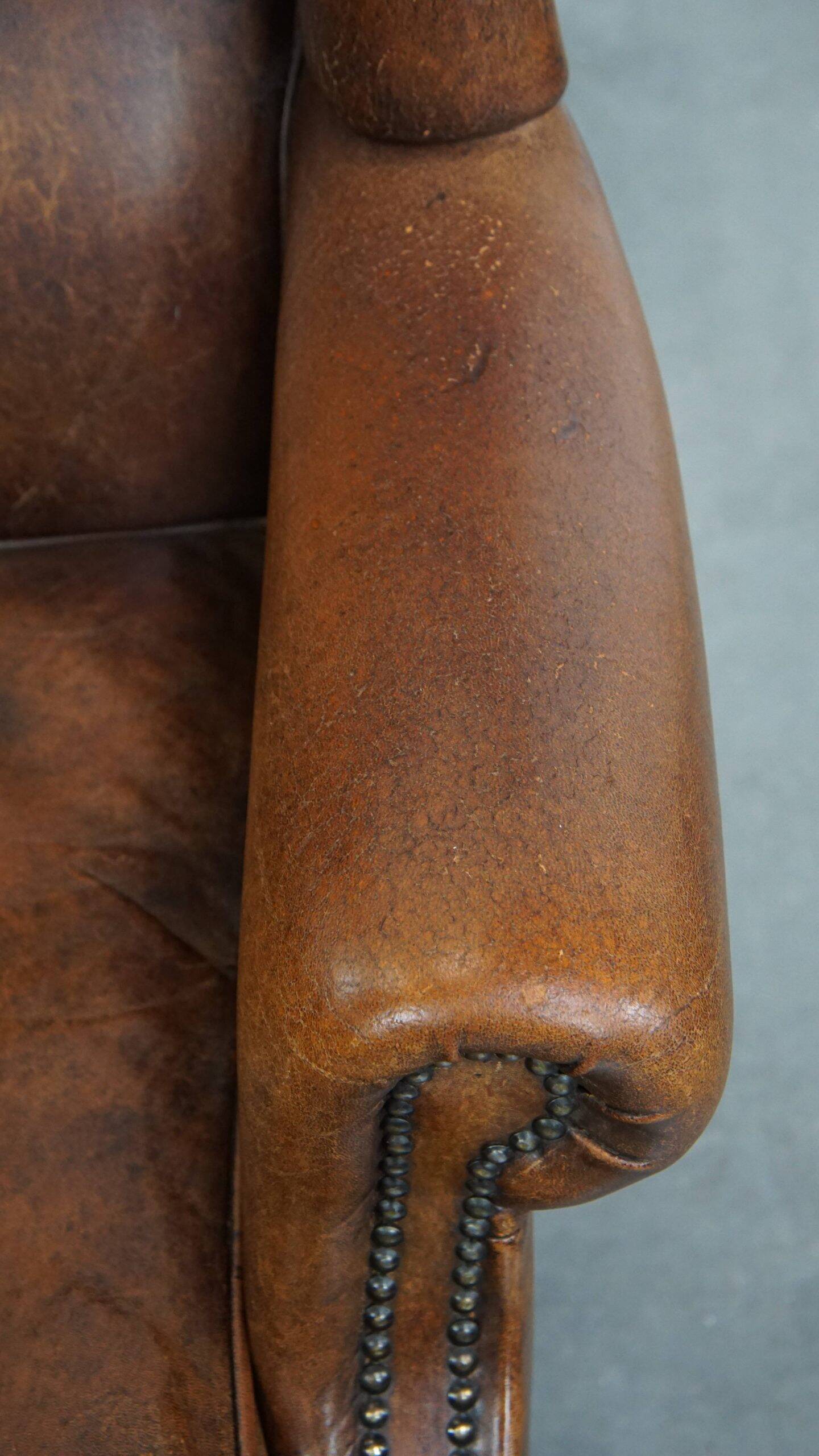 Sheepskin wingback chair in good condition