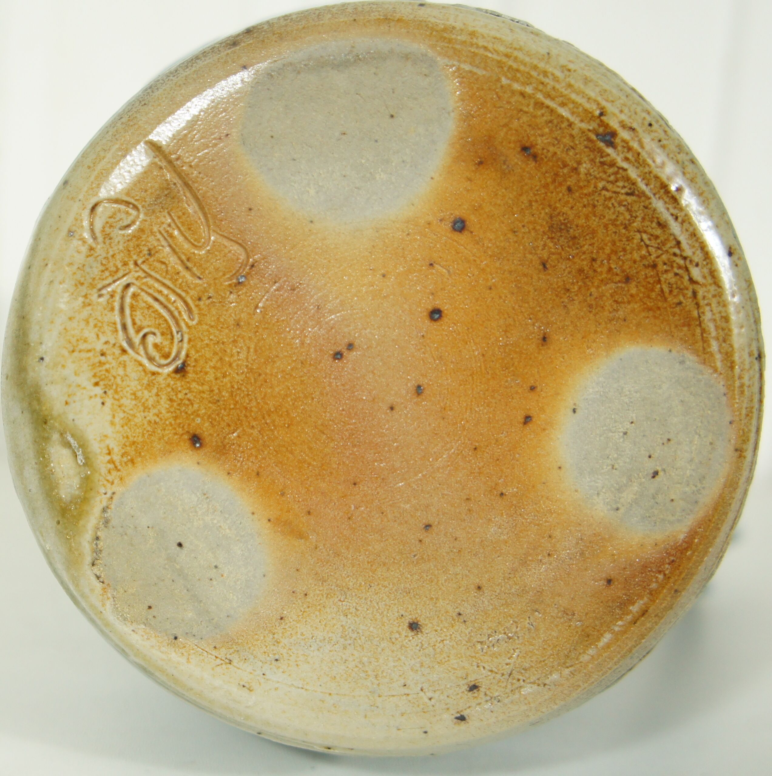 Pitcher in glazed blue sandstone signed