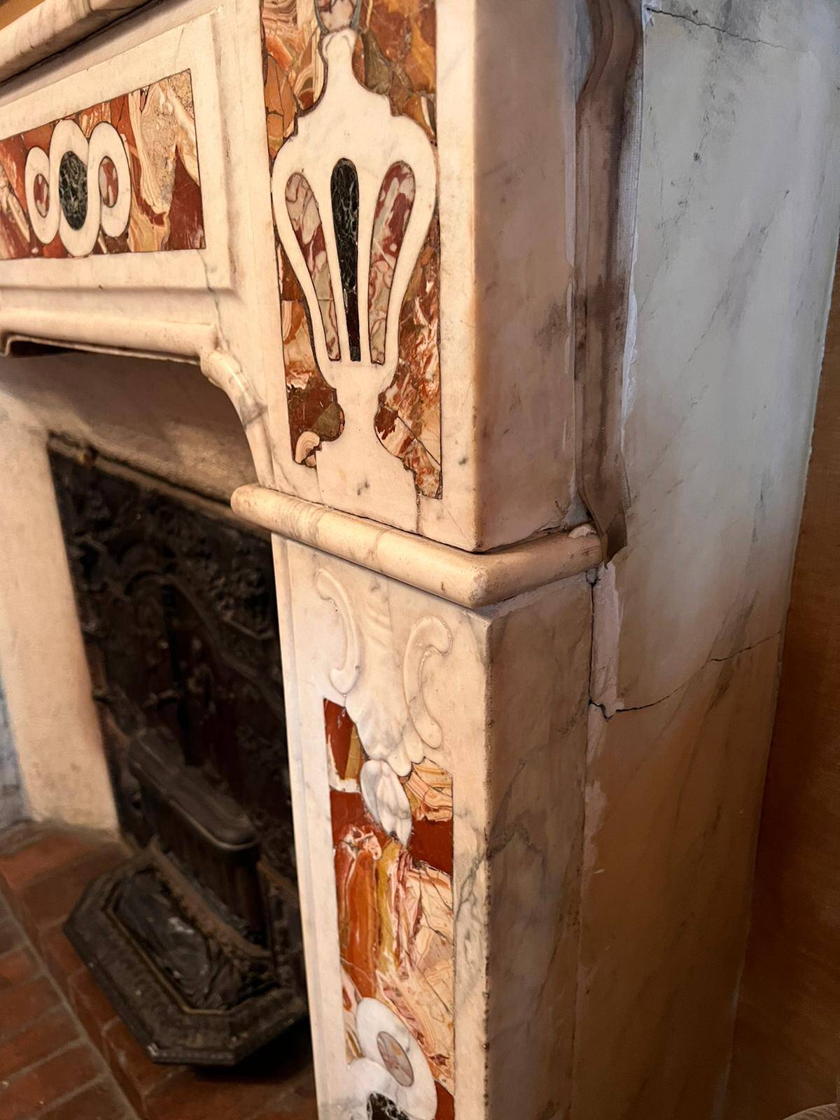 Carrara marble fireplace with 18th century incrustations