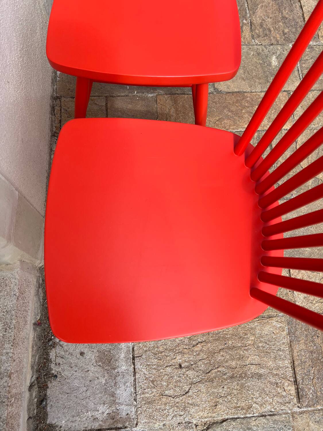 Pair of vintage red Scandinavian chairs from IKEA.