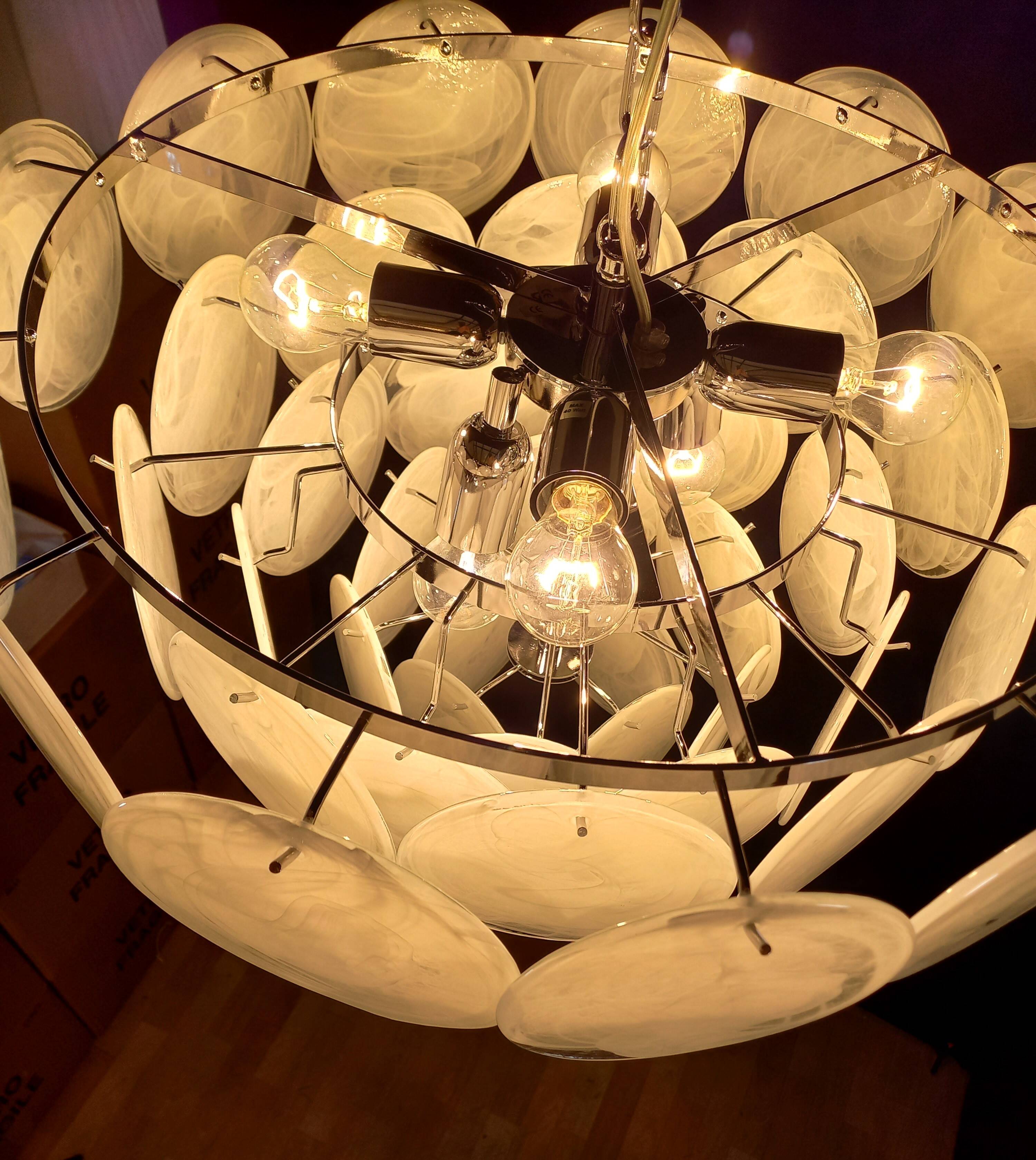 Handcrafted chandelier with Murano glass and handmade alabaster discs.